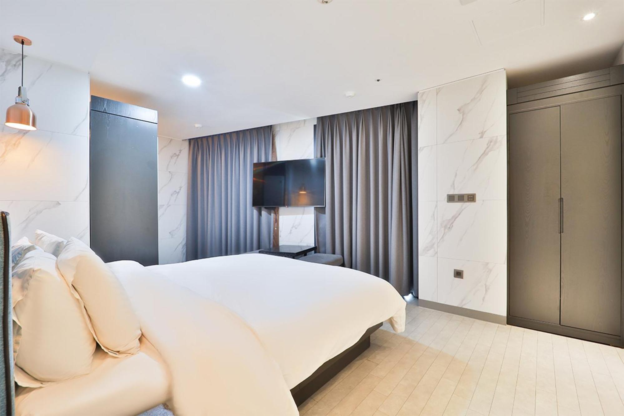 Hotel Yuna Business Ciudad Metropolitana de Ciudad Metropolitana de Busan Habitación foto